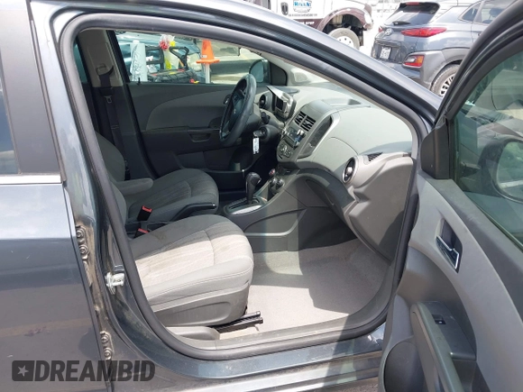 2012 Chevrolet Sonic LT with VIN 1G1JC5SH1C4182616, listed as a IAAI auction lot 42081899 with 92,802 mi miles and . Bid and sale history available at DreamBid. Image 5.