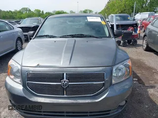 2011 Dodge Caliber Mainstreet with VIN 1B3CB3HA1BD247594, listed as a IAAI auction lot 42082305 with 122,438 mi miles. Bid and sale history available at carsss.com. Image 6.
