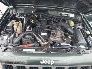1997 Jeep Cherokee Sport with VIN 1J4FJ68SXVL582060, listed as a IAAI auction lot 41333519 with 183,580 mi miles. Bid and sale history available at carsss.com. Image 10.