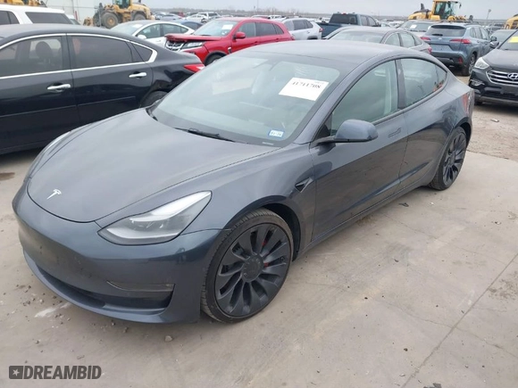 2022 Tesla Model 3 Performance with VIN 5YJ3E1EC9NF130410, listed as a IAAI auction lot 41711708 with 26,937 mi miles. Bid and sale history available at carsss.com. Image 2.