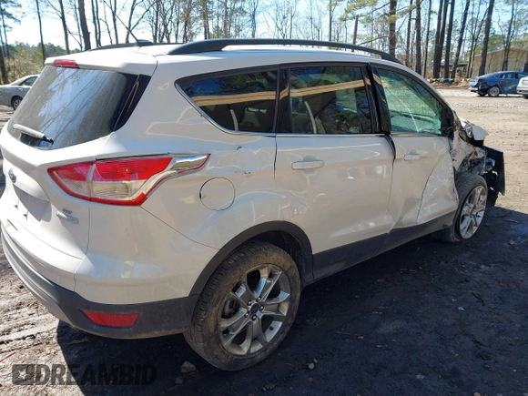 2016 Ford Escape SE with VIN 1FMCU0G9XGUB90670, listed as a IAAI auction lot 41694382 with 167,631 mi miles. Bid and sale history available at carsss.com. Image 4.