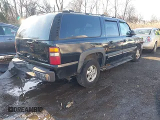 2002 Chevrolet Suburban Z71 with VIN 3GNFK16Z42G199561, listed as a IAAI auction lot 41442707 with 229,823 mi miles. Bid and sale history available at carsss.com. Image 4.