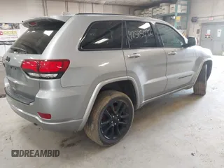 2018 Jeep Grand Cherokee Laredo E with VIN 1C4RJFAG7JC203793, listed as a IAAI auction lot 42585072 with 263,987 mi miles and . Bid and sale history available at DreamBid. Image 4.