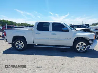 2010 GMC Sierra 1500 SLE z VIN 3GTRCVE04AG138237, wystawiony jako IAAI lot #41860472 z przebiegiem 56 831 mil mil oraz . Historia ofert i sprzedaży dostępna na DreamBid. Obrazek 14.