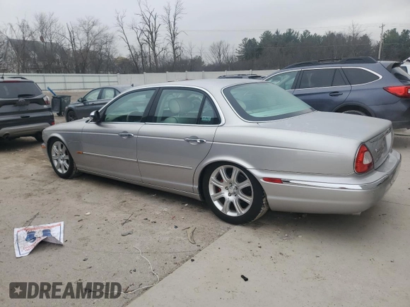 2004 Jaguar XJ with VIN SAJEA74C64SG08121, listed as a Copart auction lot 81736984 with 100,144 mi miles and Non Repairable. Bid and sale history available at DreamBid. Image 2.