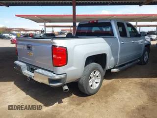 2016 Chevrolet Silverado 1500 LT with VIN 1GCRCREC3GZ185219, listed as a IAAI auction lot 41970474 with 124,101 mi miles and . Bid and sale history available at DreamBid. Image 4.