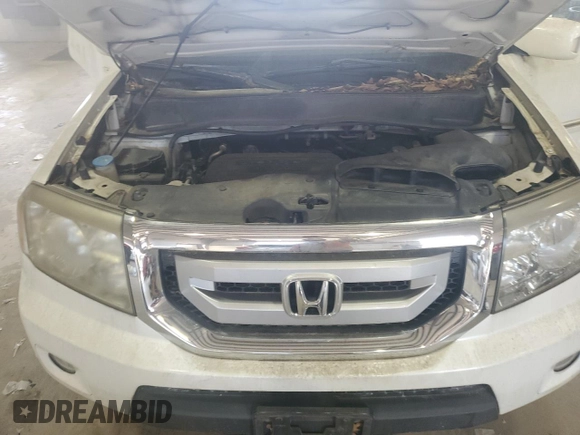 2011 Honda Pilot Touring z VIN 5FNYF3H91BB035074, wystawiony jako Copart lot #54789885 z przebiegiem 196 234 mil mil oraz Czysty tytuł • Clean title. Historia ofert i sprzedaży dostępna na DreamBid. Obrazek 12.