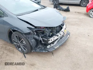 2024 Toyota Prius LE with VIN JTDACAAU8R3028529, listed as a IAAI auction lot 42079826 with 7,849 mi miles and . Bid and sale history available at DreamBid. Image 18.