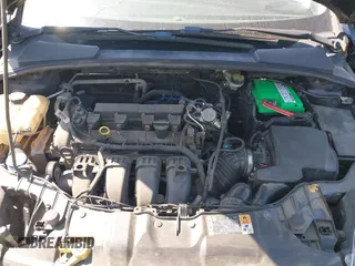 2014 Ford Focus SE with VIN 1FADP3K29EL273107, listed as a IAAI auction lot 42083524 with 140,834 mi miles. Bid and sale history available at carsss.com. Image 10.