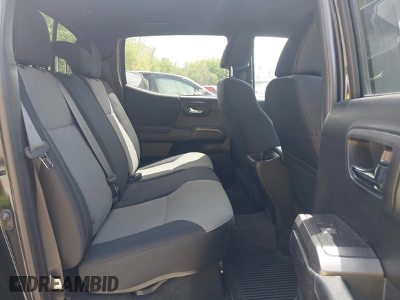 2021 Toyota Tacoma SR with VIN 3TMCZ5AN0MM417261, listed as a IAAI auction lot 42240693 with 38,625 mi miles and . Bid and sale history available at DreamBid. Image 8.