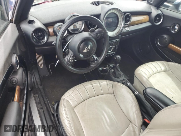 2012 MINI Convertible S z VIN WMWZP3C53CT550188, wystawiony jako Copart lot #88769895 z przebiegiem 130 696 mil mil oraz Nie do naprawy • Non repairable. Historia ofert i sprzedaży dostępna na DreamBid. Obrazek 8.
