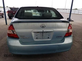 2003 Toyota Prius z VIN JT2BK18U130088117, wystawiony jako Copart lot #57264675 z przebiegiem 185 926 mil mil oraz Szkoda całkowita • Salvage title. Historia ofert i sprzedaży dostępna na DreamBid. Obrazek 6.