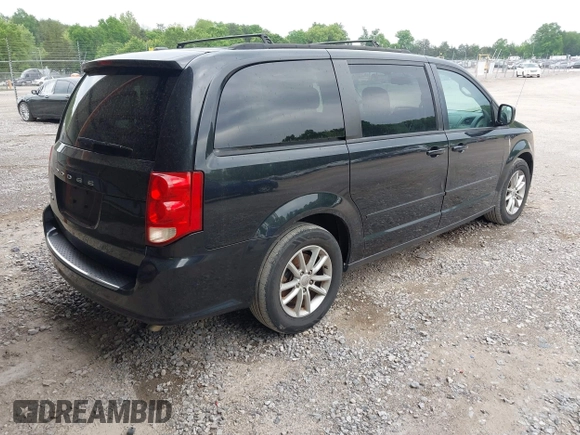 2013 Dodge Grand Caravan SXT with VIN 2C4RDGCG9DR599814, listed as a IAAI auction lot 42168424 with 173,413 mi miles and . Bid and sale history available at DreamBid. Image 4.