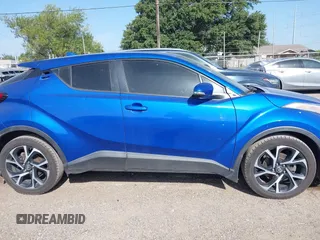 2018 Toyota C-HR XLE z VIN NMTKHMBX7JR004448, wystawiony jako IAAI lot #42785933 z przebiegiem 112 115 mil mil oraz . Historia ofert i sprzedaży dostępna na DreamBid. Obrazek 13.