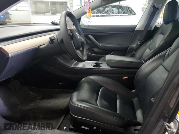 2021 Tesla Model 3 Long Range z VIN 5YJ3E1EB3MF848122, wystawiony jako Copart lot #56423005 z przebiegiem 57 619 mil mil oraz Szkoda całkowita • Salvage title. Historia ofert i sprzedaży dostępna na DreamBid. Obrazek 7.