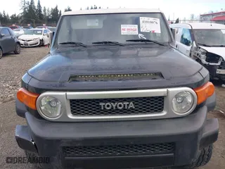 2008 Toyota FJ Cruiser with VIN JTEBU11F780104062, listed as a IAAI auction lot 41010076 with 220,975 mi miles. Bid and sale history available at carsss.com. Image 12.