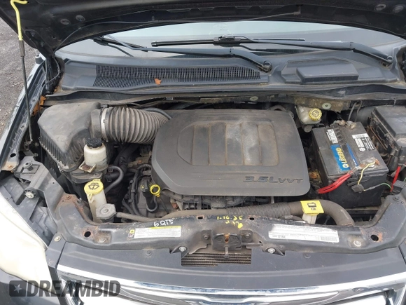 2011 Chrysler Town & Country Touring L with VIN 2A4RR8DG7BR641782, listed as a IAAI auction lot 42042025 with 141,884 mi miles and . Bid and sale history available at DreamBid. Image 10.