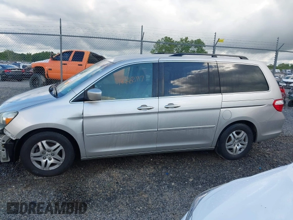 2006 Honda Odyssey EX z VIN 5FNRL38406B403736, wystawiony jako IAAI lot #42288117 z przebiegiem 159 686 mil mil oraz . Historia ofert i sprzedaży dostępna na DreamBid. Obrazek 15.
