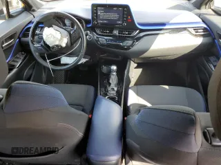 2021 Toyota C-HR LE z VIN NMTKHMBX1MR121205, wystawiony jako Copart lot #52317525 z przebiegiem 73 654 mil mil oraz Nie do naprawy. Historia ofert i sprzedaży dostępna na DreamBid. Obrazek 8.