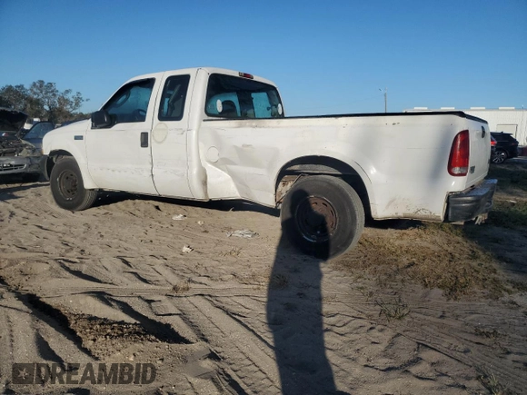 2003 Ford F-250 XL with VIN 1FTNX20L73EC70163, listed as a Copart auction lot 77061204 with 387,321 mi miles and Salvage title. Bid and sale history available at DreamBid. Image 2.