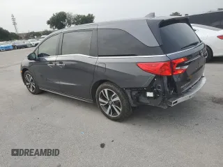 2024 Honda Odyssey Touring z VIN 5FNRL6H85RB016317, wystawiony jako Copart lot #59483565 z przebiegiem 17 351 mil mil oraz Nie do naprawy • Non repairable. Historia ofert i sprzedaży dostępna na DreamBid. Obrazek 2.