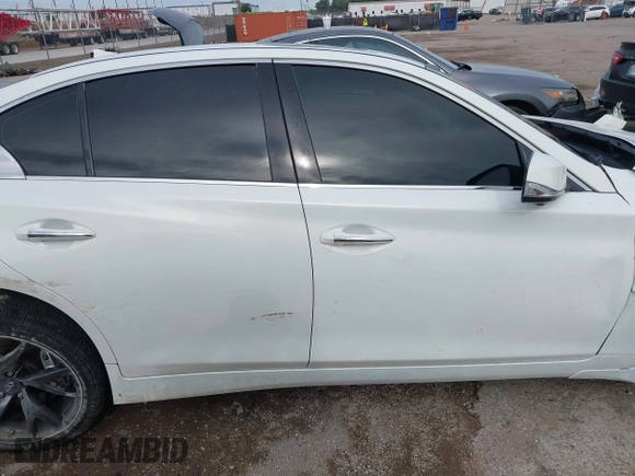 2015 Infiniti Q50 Premium z VIN JN1BV7APXFM352327, wystawiony jako IAAI lot #42367983 z przebiegiem 110 636 mil mil oraz . Historia ofert i sprzedaży dostępna na DreamBid. Obrazek 13.