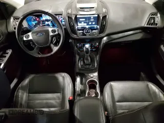 2014 Ford Escape Titanium with VIN 1FMCU9J94EUC25357, listed as a Copart auction lot 47595705 with 124,626 mi miles and Salvage Title. Bid and sale history available at DreamBid. Image 8.
