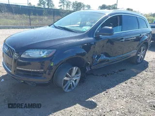 2014 Audi Q7 Premium Plus with VIN WA1LGAFE5ED014701, listed as a IAAI auction lot 42107552 with 98,919 mi miles and . Bid and sale history available at DreamBid. Image 2.
