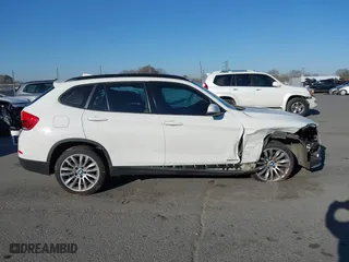 2015 BMW X1 xDrive28i with VIN WBAVL1C50FVY26009, listed as a IAAI auction lot 41495667 with 109,807 mi miles. Bid and sale history available at carsss.com. Image 13.