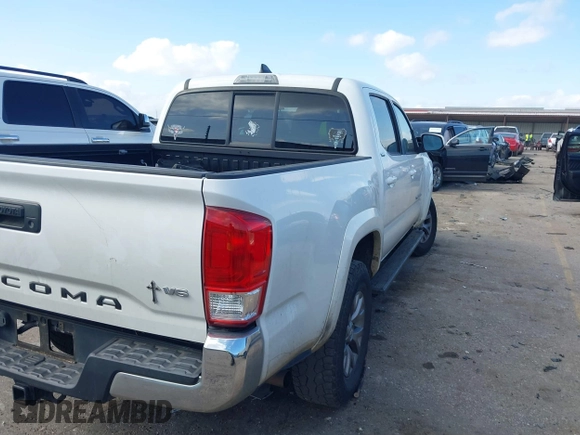 2017 Toyota Tacoma SR5 with VIN 5TFAZ5CN8HX043633, listed as a IAAI auction lot 41520703 with 104,711 mi miles and . Bid and sale history available at DreamBid. Image 4.