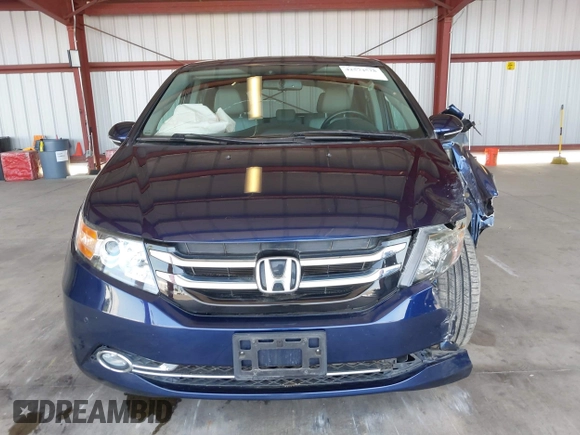 2017 Honda Odyssey Touring with VIN 5FNRL5H90HB017215, listed as a IAAI auction lot 42574528 with 61,386 mi miles and . Bid and sale history available at DreamBid. Image 12.