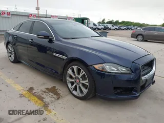 2018 Jaguar XJ R-Sport z VIN SAJWA1C74J8W14026, wystawiony jako IAAI lot #42032719 z przebiegiem 95 263 mil mil oraz . Historia ofert i sprzedaży dostępna na DreamBid. Obrazek 1.