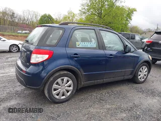 2011 Suzuki SX4 Crossover with VIN JS2YB5A31B6304110, listed as a IAAI auction lot 42023959 with 127,730 mi miles. Bid and sale history available at carsss.com. Image 4.