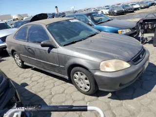 1999 Honda Civic DX with VIN 1HGEJ6227XL086048, listed as a Copart auction lot 69161104 with 139,789 mi miles and Clean Title. Bid and sale history available at carsss.com. Image 4.