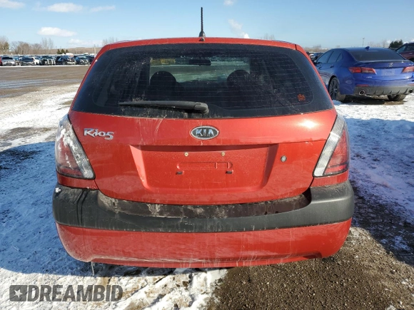 2009 Kia Rio LX with VIN KNADE243596567394, listed as a Copart auction lot 42240065 with 160,044 mi miles and Salvage Title. Bid and sale history available at carsss.com. Image 6.