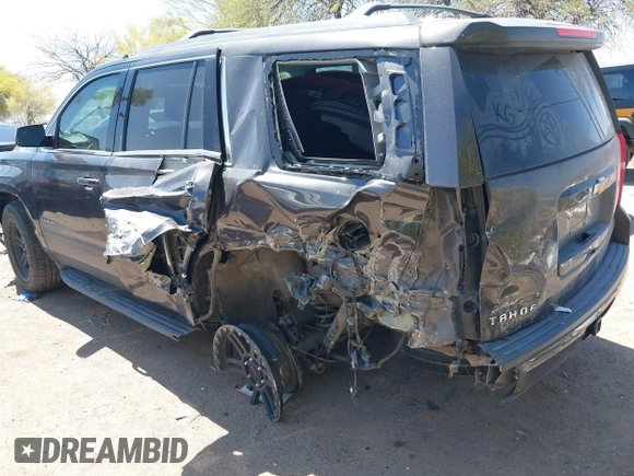 2017 Chevrolet Tahoe LS with VIN 1GNSCAKC3HR328833, listed as a IAAI auction lot 41993364 with 124,817 mi miles and . Bid and sale history available at DreamBid. Image 3.