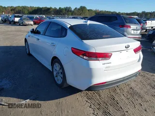 2016 Kia Optima LX with VIN 5XXGT4L36GG005859, listed as a IAAI auction lot 41053277 with 127,783 mi miles. Bid and sale history available at carsss.com. Image 3.