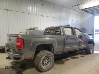 2018 GMC Sierra 2500HD Denali z VIN 1GT12UEY9JF121158, wystawiony jako Copart lot #87449504 z przebiegiem 170 506 mil mil oraz Szkoda całkowita • Salvage title. Historia ofert i sprzedaży dostępna na DreamBid. Obrazek 3.