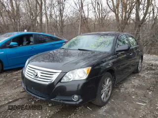 2010 Toyota Avalon XL with VIN 4T1BK3DB7AU359643, listed as a IAAI auction lot 41561066 with 171,526 mi miles and . Bid and sale history available at carsss.com. Image 2.