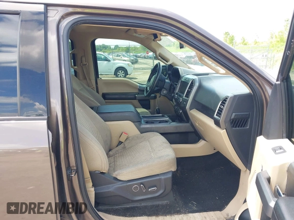 2015 Ford F-150 XL with VIN 1FTEW1CGXFKD07711, listed as a IAAI auction lot 42371362 with 128,186 mi miles and . Bid and sale history available at DreamBid. Image 5.