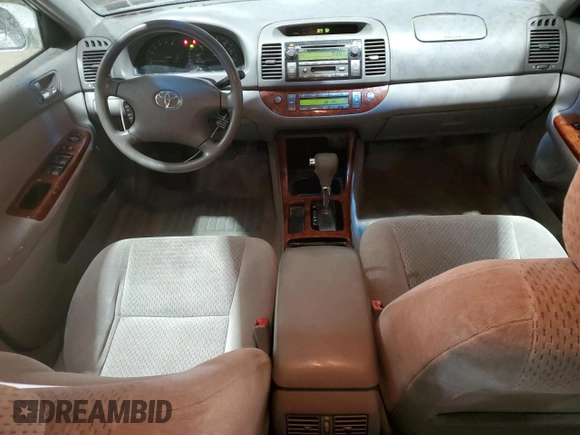 2002 Toyota Camry LE z VIN 4T1BE32K32U063577, wystawiony jako Copart lot #58782185 z przebiegiem 243 589 mil mil oraz Szkoda całkowita • Salvage title. Historia ofert i sprzedaży dostępna na DreamBid. Obrazek 8.