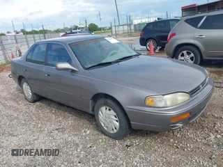 1996 Toyota Camry DX with VIN JT2BG12K1T0356821, listed as a IAAI auction lot 41860018 with 278,326 mi miles. Bid and sale history available at carsss.com. Image 1.