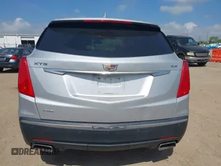 2017 Cadillac XT5 Premium Luxury AWD z VIN 1GYKNERS6HZ112170, wystawiony jako IAAI lot #42262116 z przebiegiem 140 982 mil mil oraz . Historia ofert i sprzedaży dostępna na DreamBid. Obrazek 16.