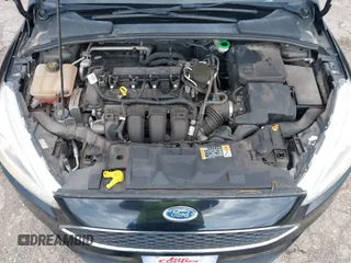 2016 Ford Focus SE z VIN 1FADP3F2XGL312445, wystawiony jako IAAI lot #42288210 z przebiegiem 64 115 mil mil oraz . Historia ofert i sprzedaży dostępna na DreamBid. Obrazek 10.
