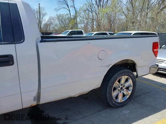 2014 Ford F-150 XL with VIN 1FTMF1CM1EKD53945, listed as a IAAI auction lot 41889789 with 296,163 mi miles and . Bid and sale history available at DreamBid. Image 6.