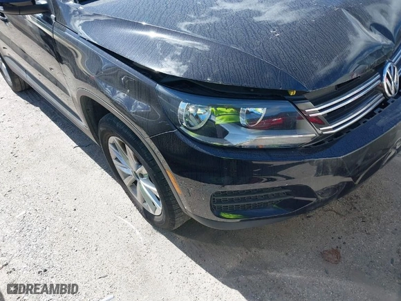 2017 Volkswagen Tiguan S with VIN WVGAV7AX2HK051246, listed as a IAAI auction lot 41665461 with 63,531 mi miles. Bid and sale history available at carsss.com. Image 17.