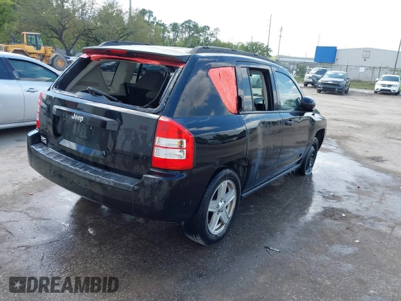 2007 Jeep Compass Sport with VIN 1J8FT47W57D119595, listed as a IAAI auction lot 41782027 with 223,203 mi miles. Bid and sale history available at carsss.com. Image 4.