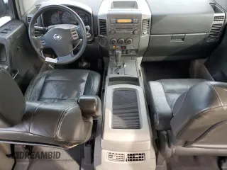 2004 Nissan Titan LE with VIN 1N6AA07A74N516071, listed as a Copart auction lot 87472284 with 140,011 mi miles and Salvage Title. Bid and sale history available at DreamBid. Image 8.