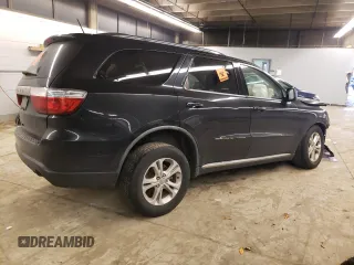 2012 Dodge Durango SXT z VIN 1C4RDJAG8CC198214, wystawiony jako Copart lot #52154065 z przebiegiem 128 787 mil mil oraz Nie do naprawy • Non repairable. Historia ofert i sprzedaży dostępna na DreamBid. Obrazek 3.