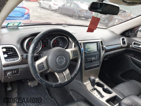2012 Jeep Grand Cherokee Laredo with VIN 1C4RJFAG7CC221682, listed as a IAAI auction lot 41881922 with 218,762 mi miles. Bid and sale history available at carsss.com. Image 17.